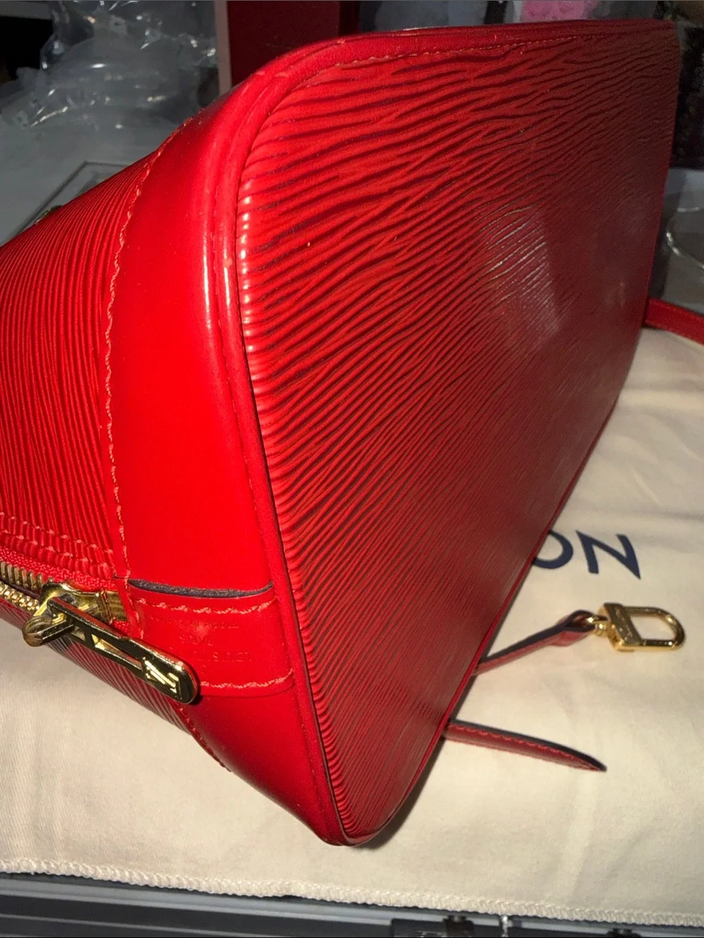 Authentic Louis Vuitton Red Epi Alma PM Satchel with Gold Hardware